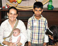 Ivonne Kuger with her son Anton and Vishwajeet Bama